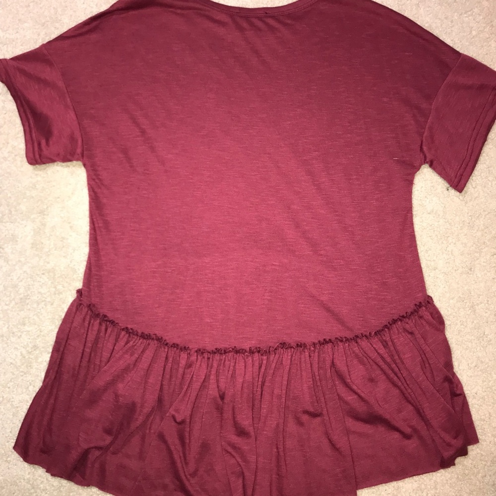 A maroon shirt